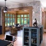 The stone and timbers in the home’s sunroom bring the outdoors in.