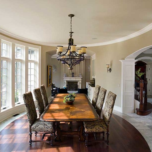The Dining Room has Wooden In-laid flooring and Multiple overlooking Full-Height Windows