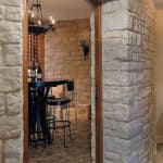 Wine Cellar with Arched Doorways & Stone Walls