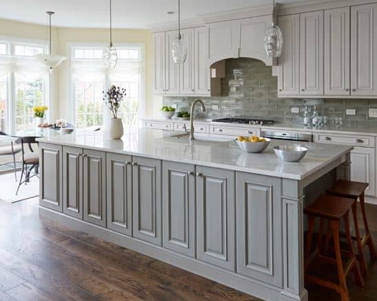 A Glenview, IL kitchen with gray and white raised-panel cabinet Doors