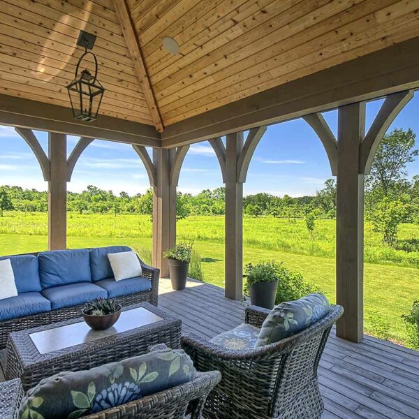 screen porch with rustic wood ceiling