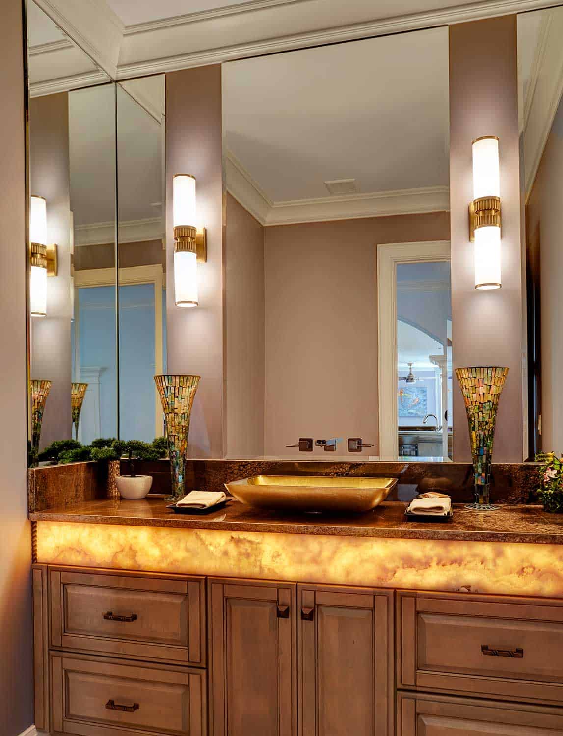 backlit-onyx-countertop-gold-vessel-sink