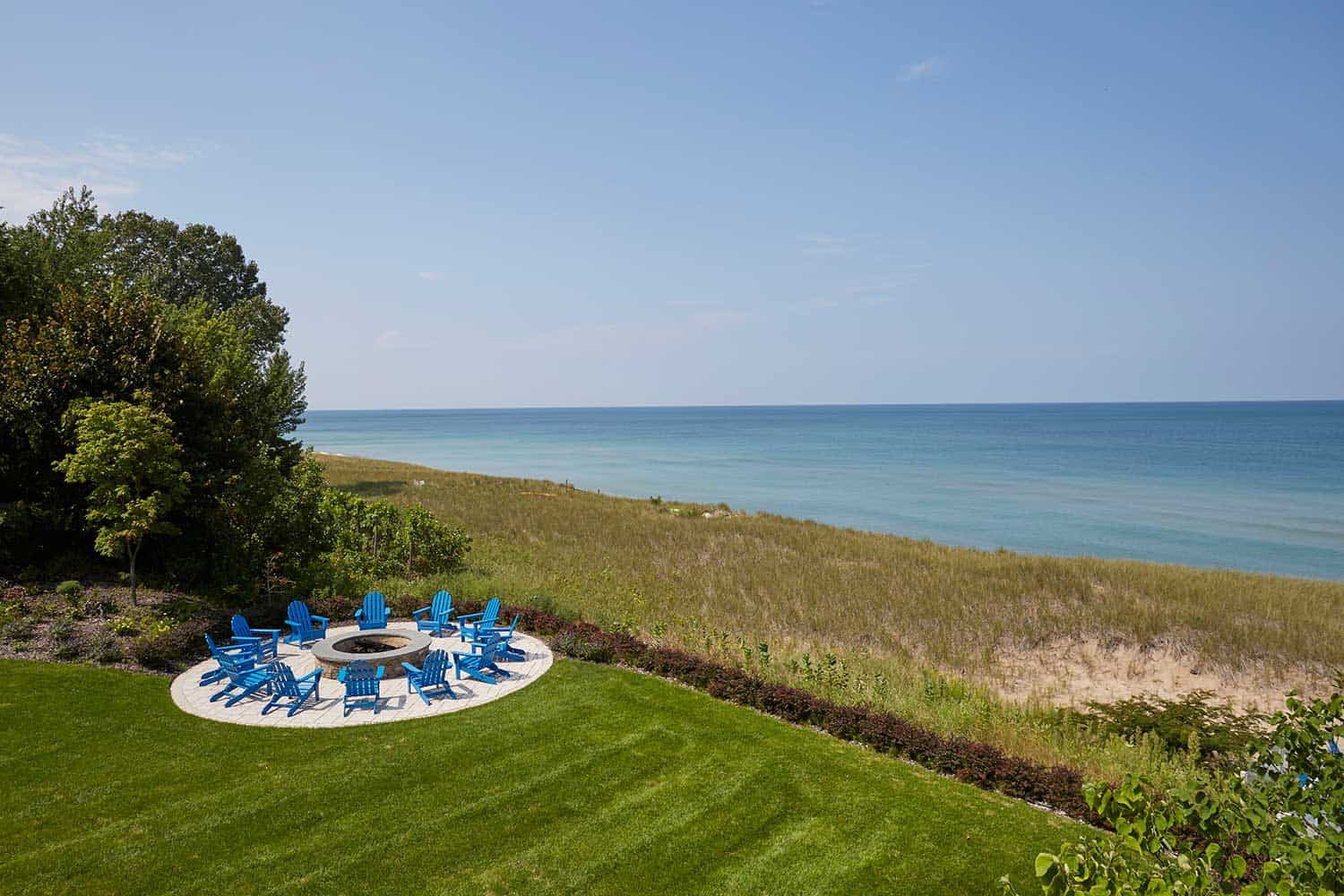 blue-adirondack-chairs-stone-fire-pit-harbor-country-mi