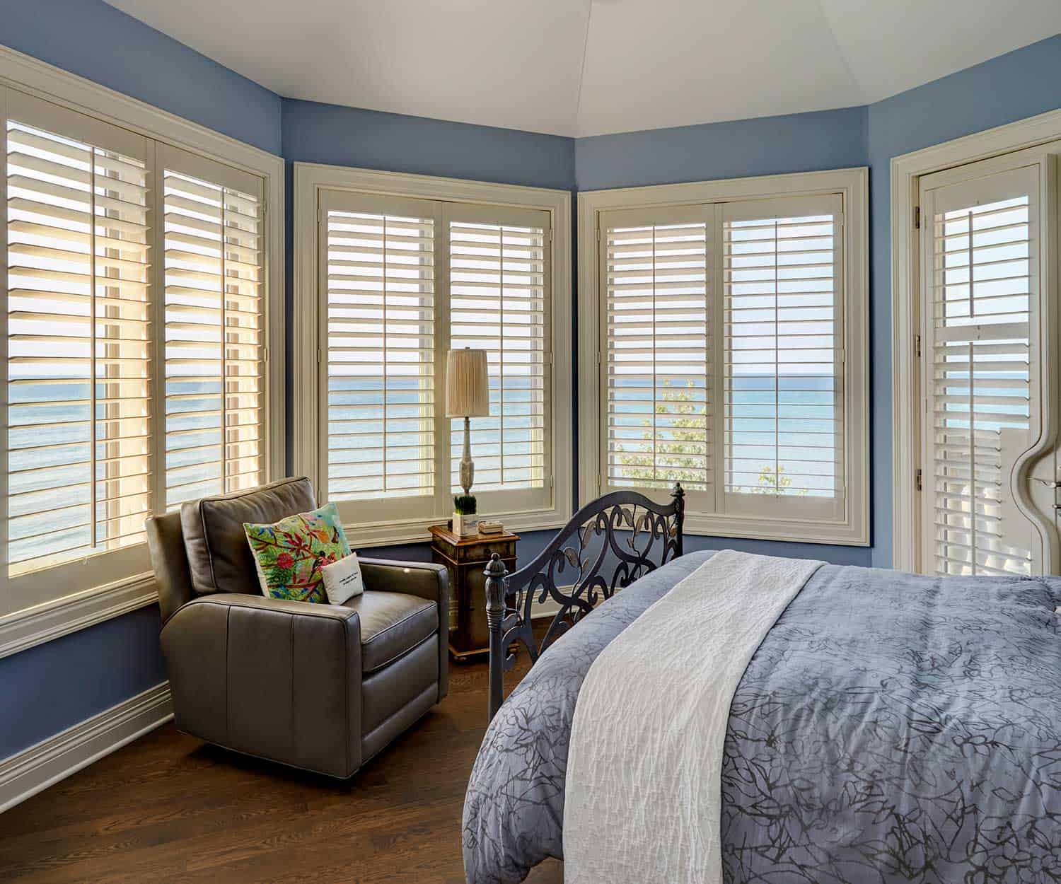 blue-bedroom-plantation-shutters