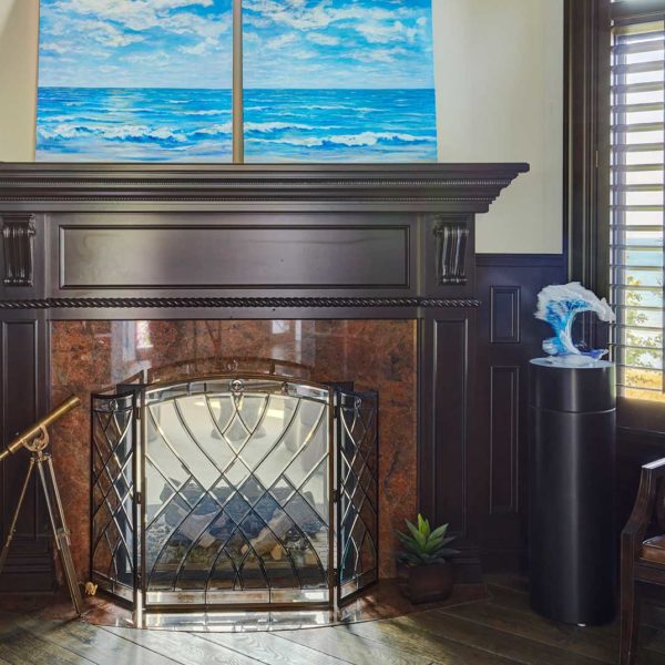 dark-wood-two-sided-fireplace-leaded-glass-screen dark-wood-two-sided-fireplace-leaded-glass-screen