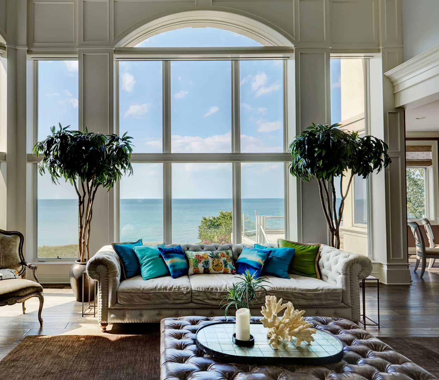 floor-to-ceiling-arched-topped-windows-lake-view