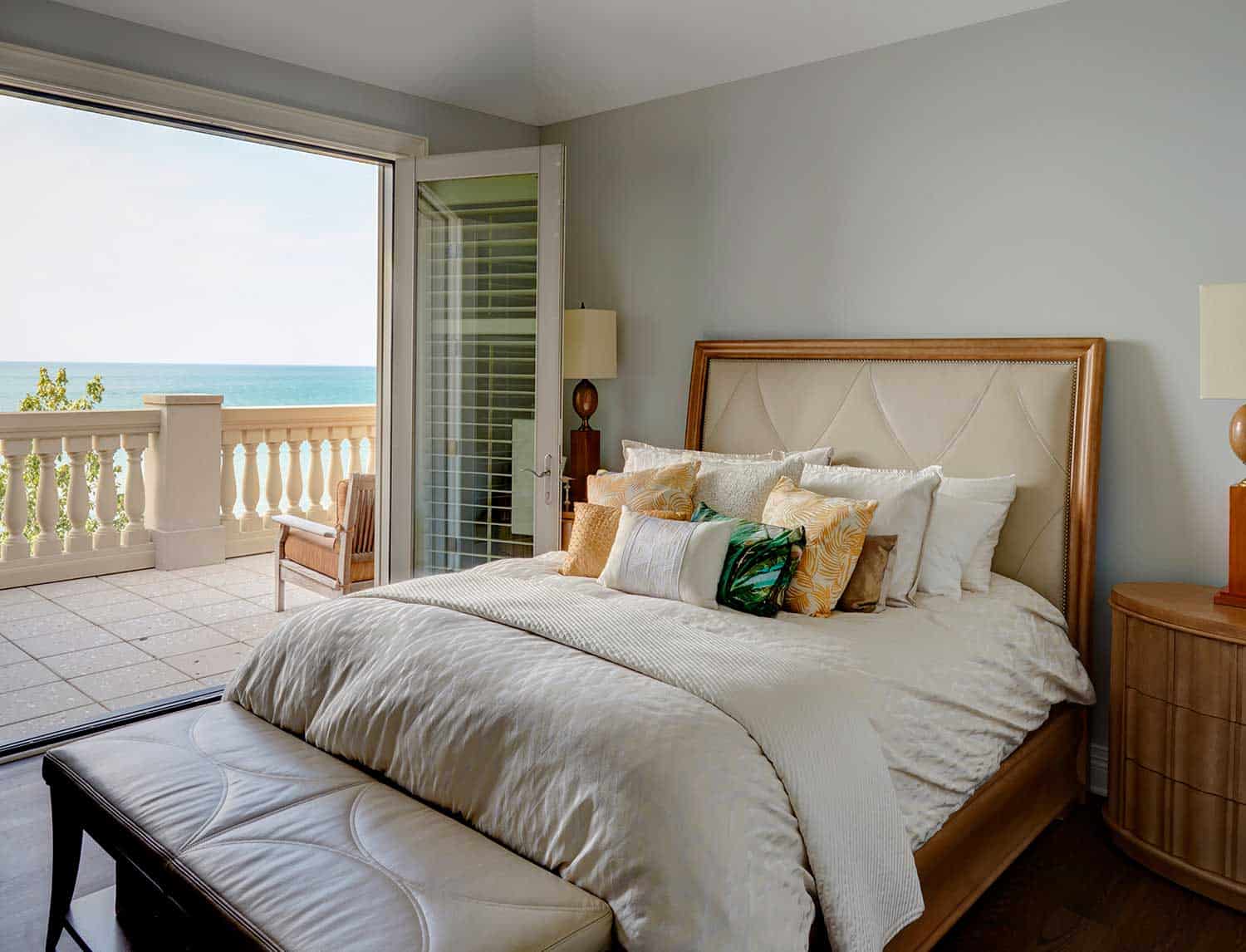 guest-bedroom-french-doors-open-to-patio-lake