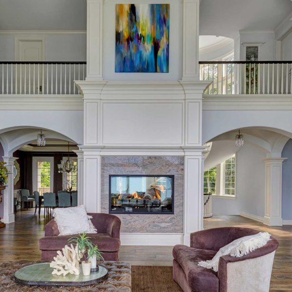 symmetrical-arched-openings-central-fireplace symmetrical-arched-openings-central-fireplace