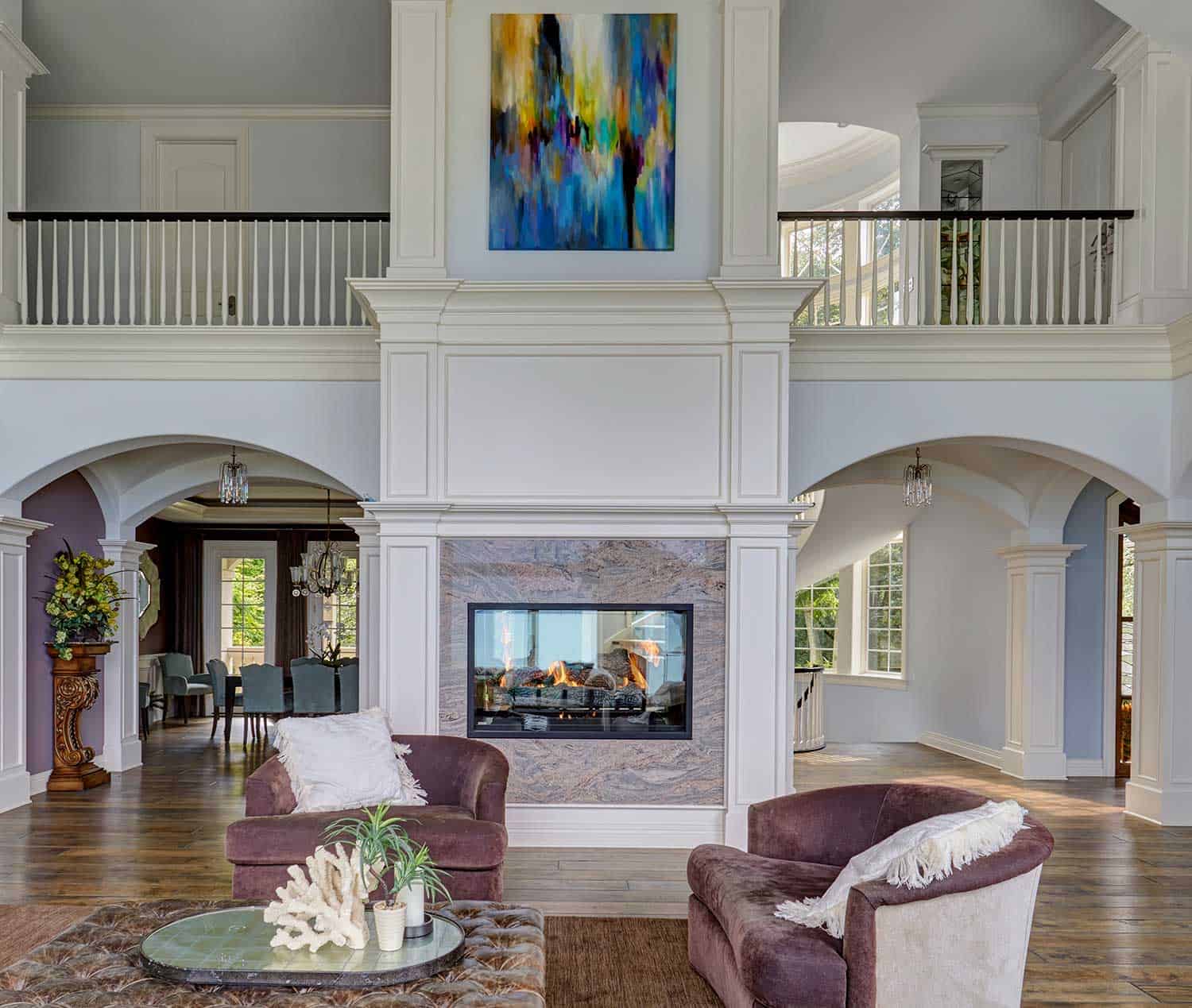 symmetrical-arched-openings-central-fireplace