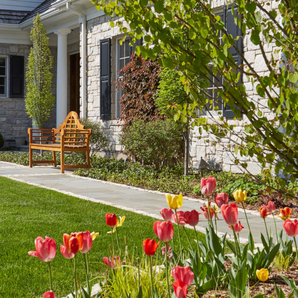 bluestone-walkway-tulips-foreground-wooden-giverny-bench bluestone-walkway-tulips-foreground-wooden-giverny-bench