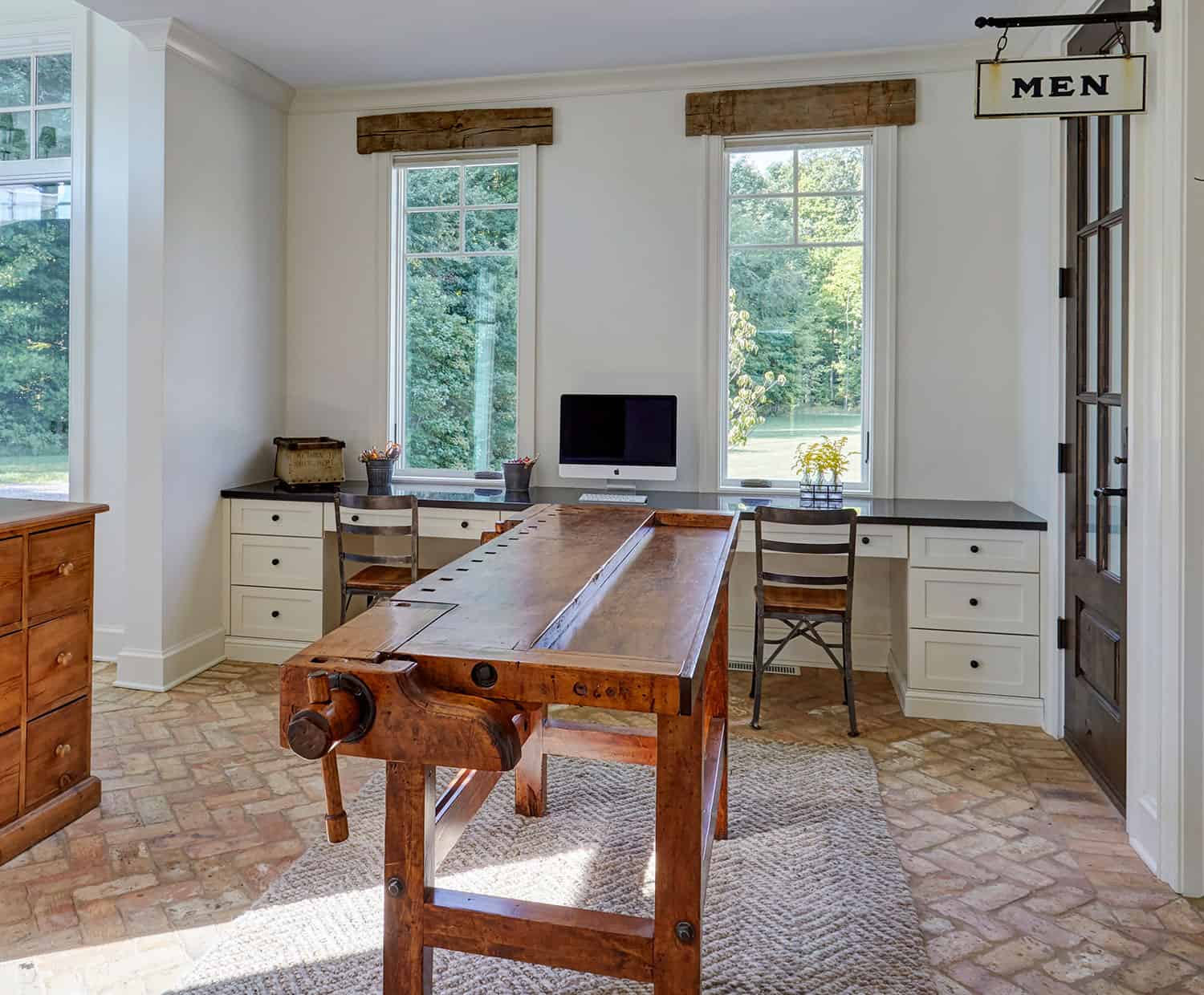 home-office-built-in-desks-brick-floors-antique-workbench