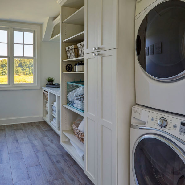 laundry-room-stacked-washer-dryer-open-shelving