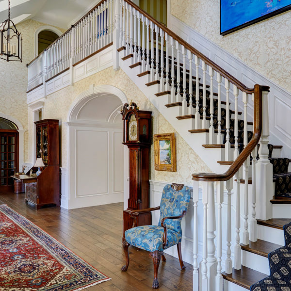 staircase-features-dark-stained-wood-treads-white-painted-balusters staircase-features-dark-stained-wood-treads-white-painted-balusters