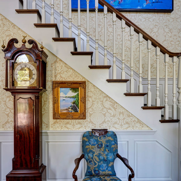 staircase-vignette-antique-grandfather-clock-blue-artwork staircase-vignette-antique-grandfather-clock-blue-artwork