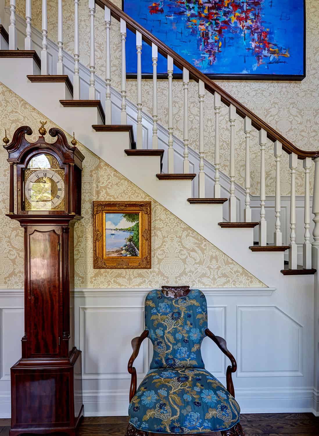 staircase-vignette-antique-grandfather-clock-blue-artwork