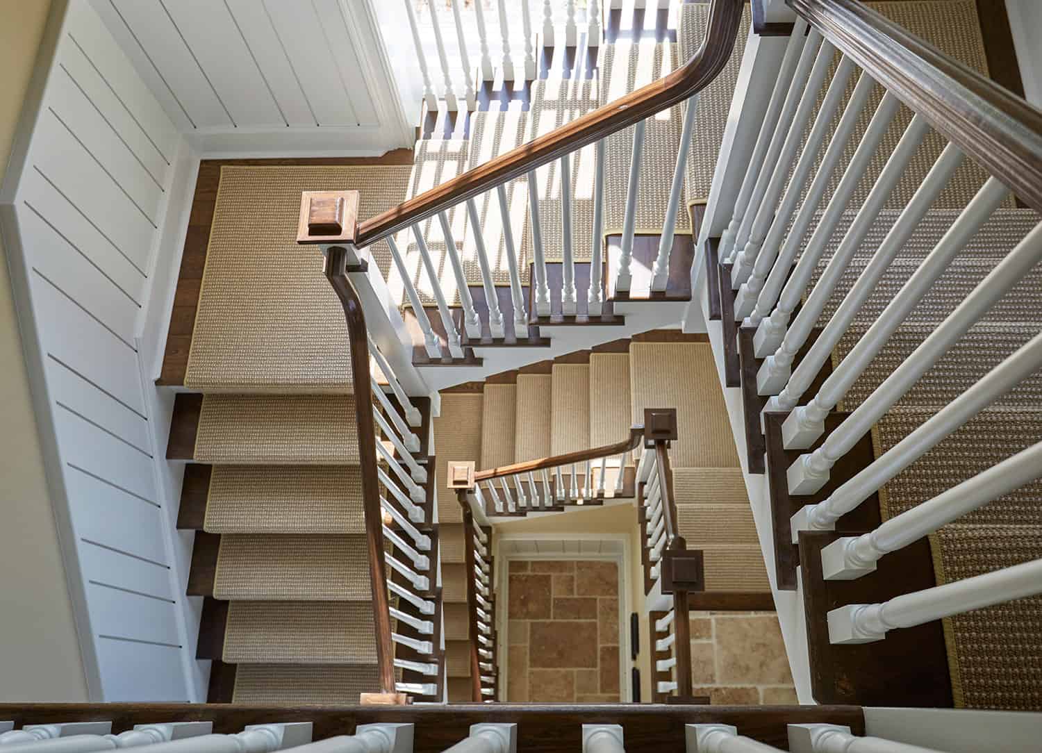 three-story-staircase-random-width-white-wainscot