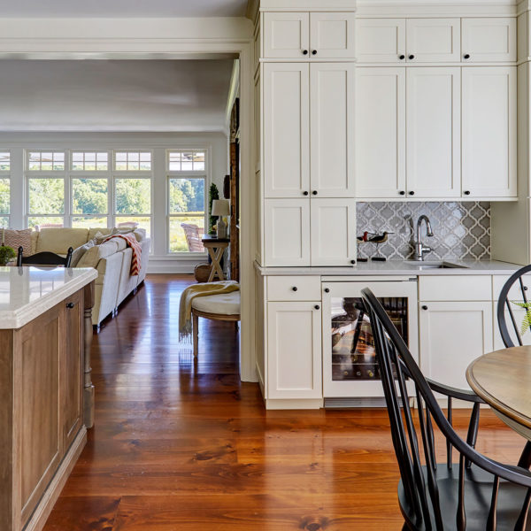 white-stacked-shaker-cabinets-11-inch-pine-floors