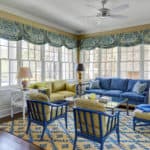 yellow-and-blue-sunroom-flooded-with-light