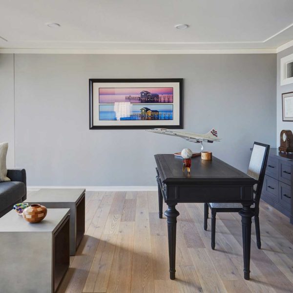 home-office-with-built-in-cabinetry-freestanding-desk