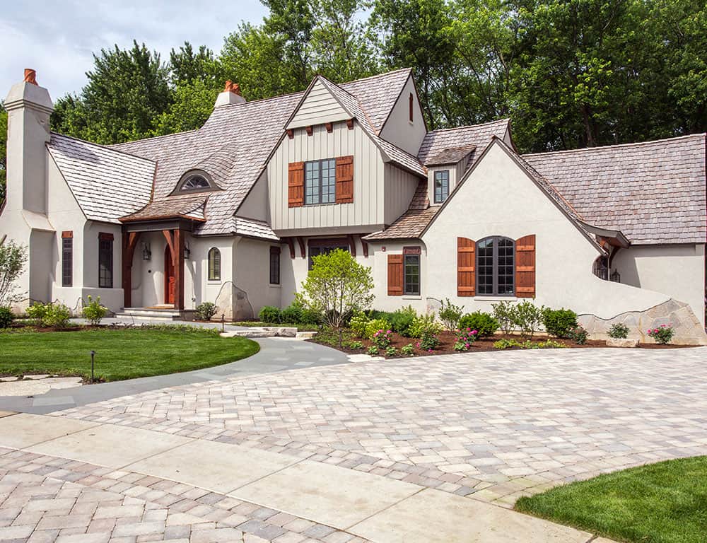 home with stucco exterior and wood shutters