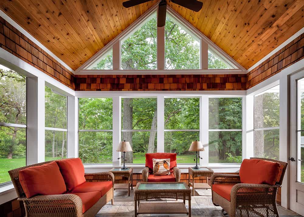 sunroom with knotty pine ceiling and cedar shake detailing