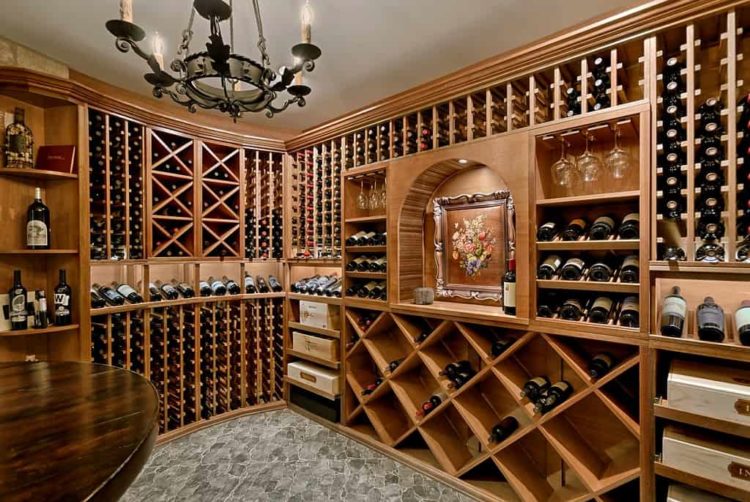 Wood wine rack A custom wooden wine cellar with wooden wine racks and overhead lighting