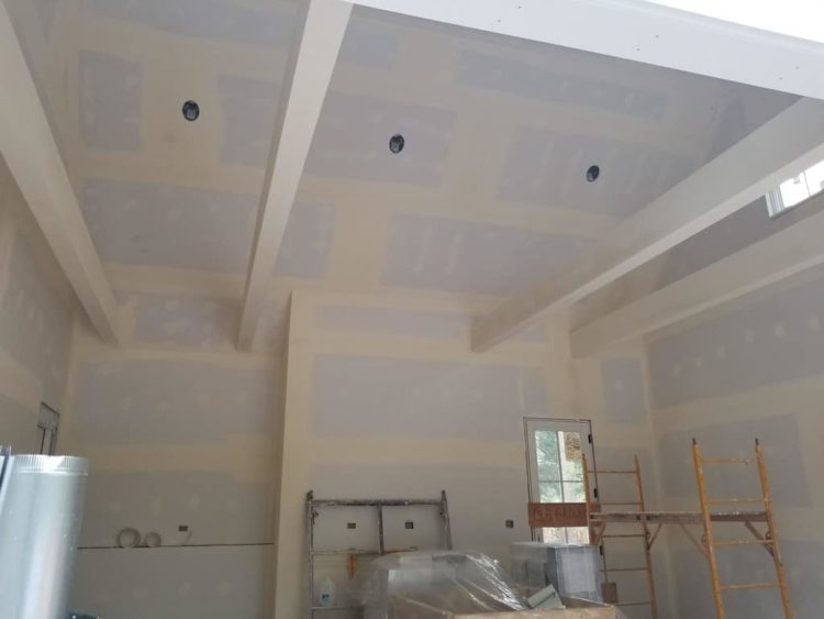 drywall with taping on house under construction drywall with taping on house under construction