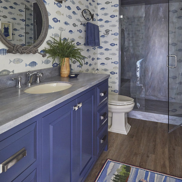 blue-vanity-whimsical-fish-wallpaper blue vanity cabinet with whimsical fish wallpaper