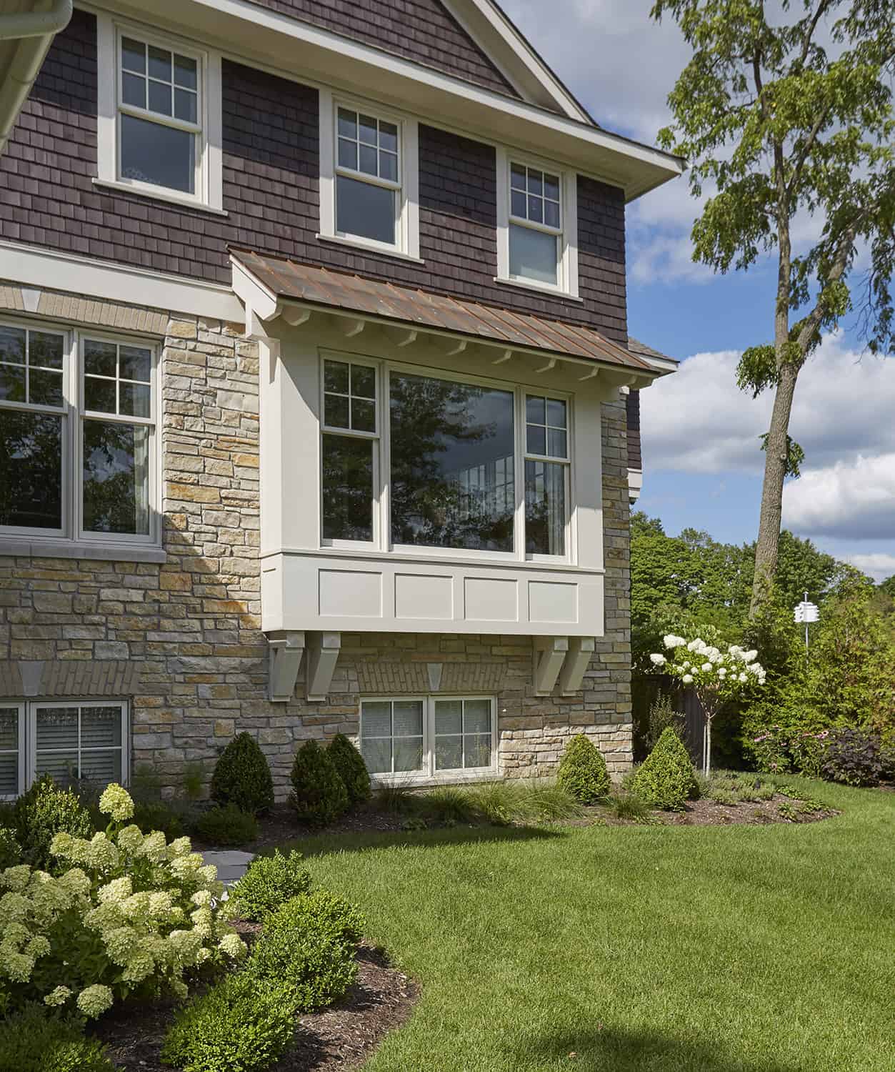 box bay window detail with standing seam copper roof