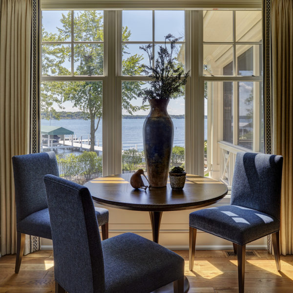breakfast-table-blue-chairs-lake-geneva-view small breakfast table with view to lake geneva