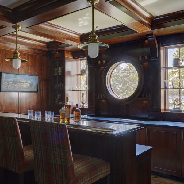 home-bar-porthole-window-boxed-beam-ceiling home bar with porthole window view
