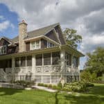 wrap around porch with detailed millwork