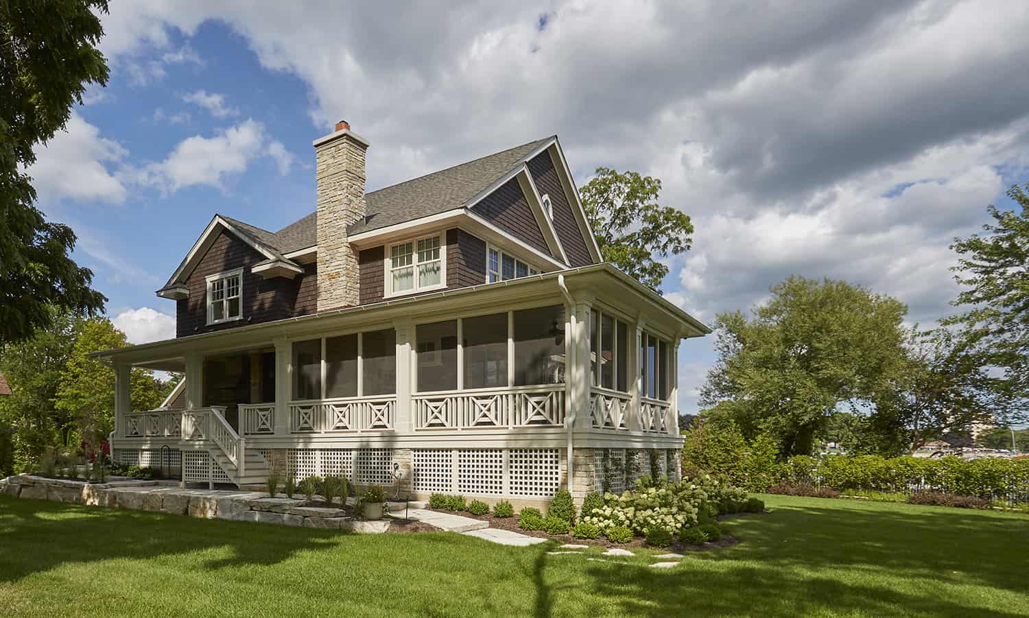 wrap around porch with detailed millwork