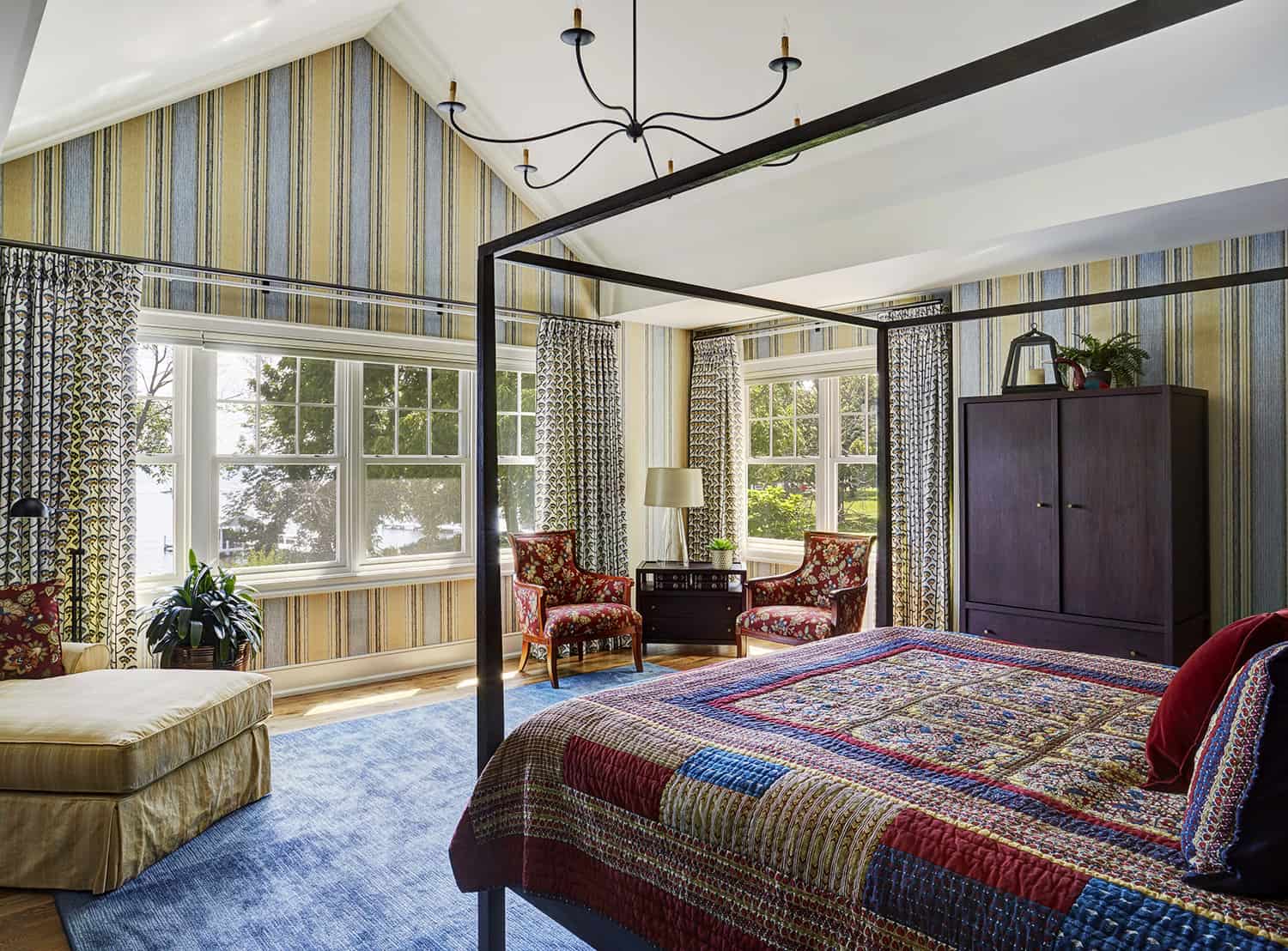 master bedroom with vaulted ceiling