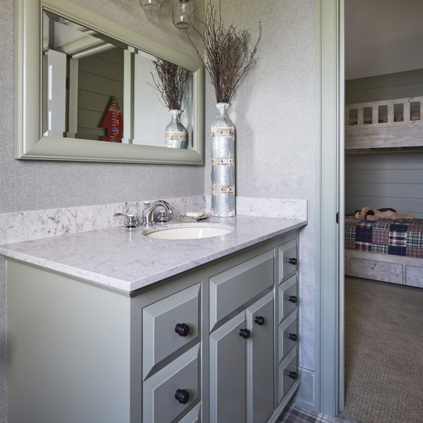 pale-green-vanity-plaid-flooring green vanity with plaid vinyl flooring