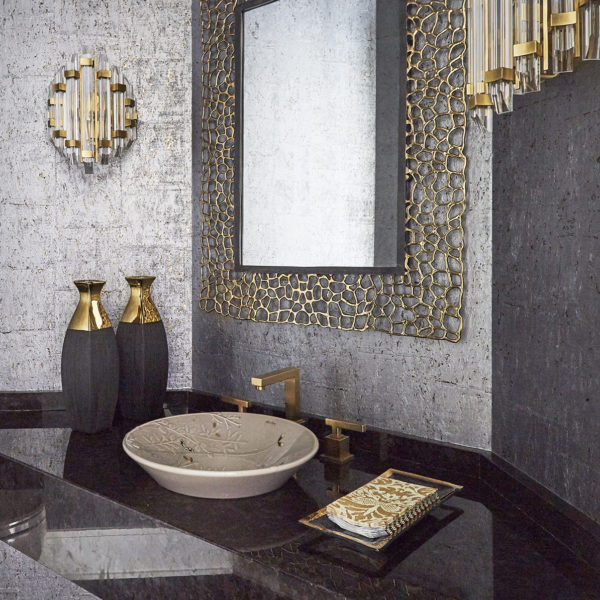 powder room with gold accents