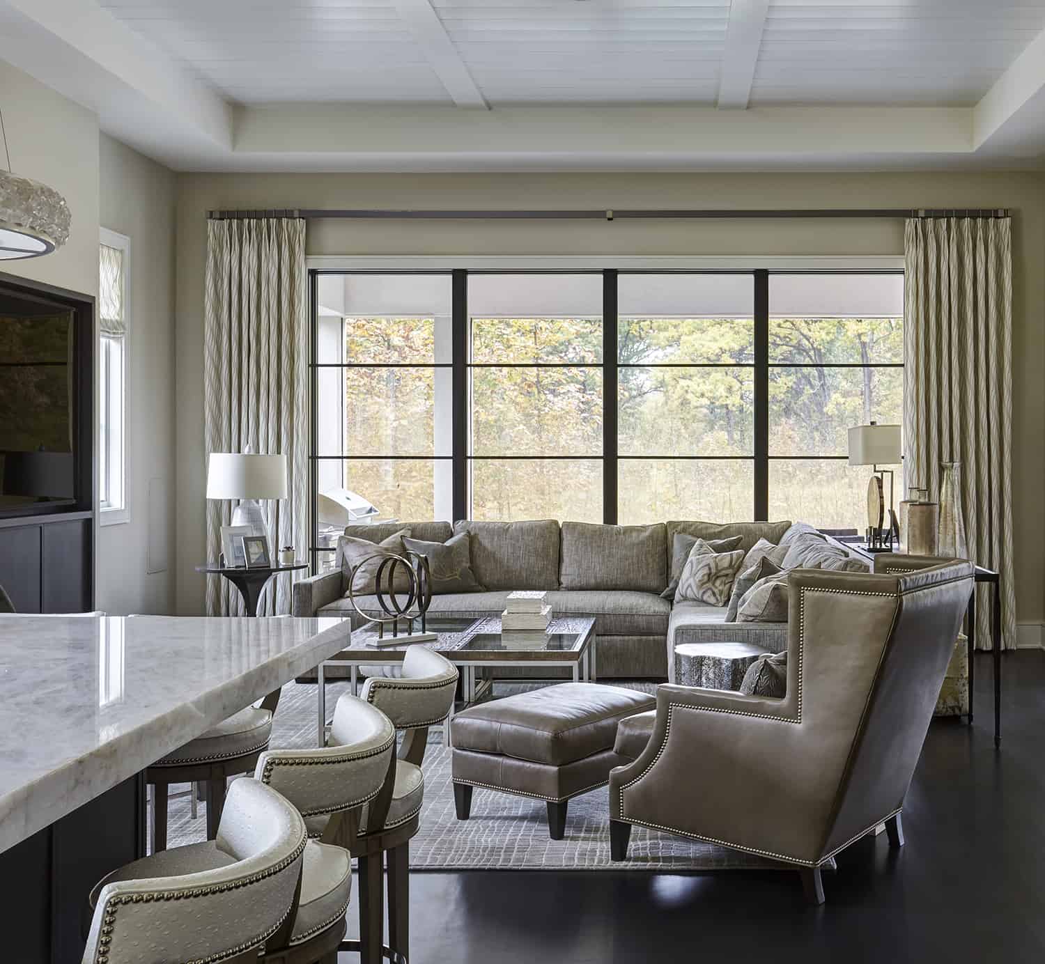 black casement windows in transitional living room