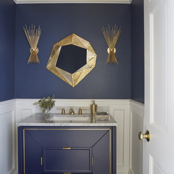 dark blue vanity against dark blue wall