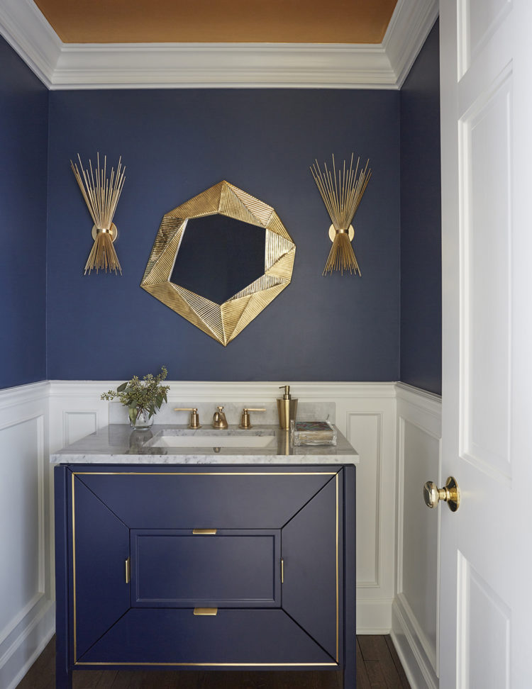 dark blue vanity against dark blue wall