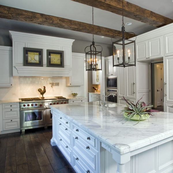 dark wood ceiling beams in luxurious suburban kitchen