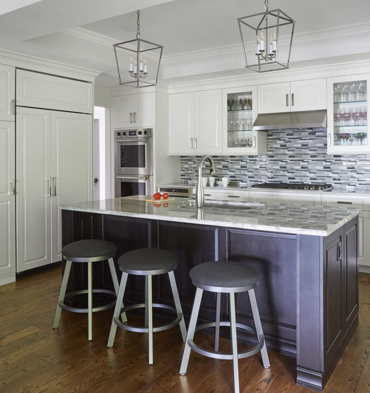 mosaic tile backsplash and dark wood island