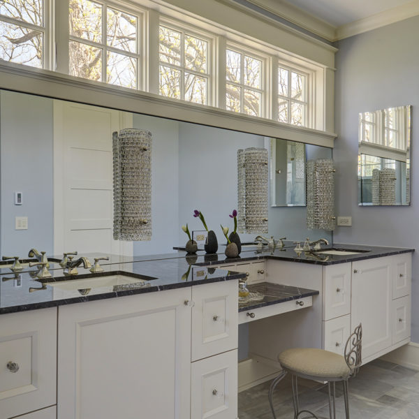 floating white vanity with clerestory windows