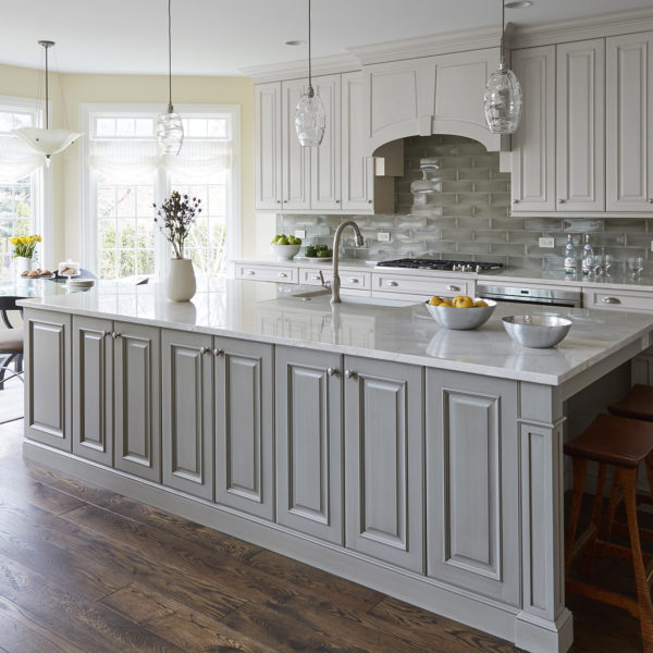 gray and white kitchen with breakfast room