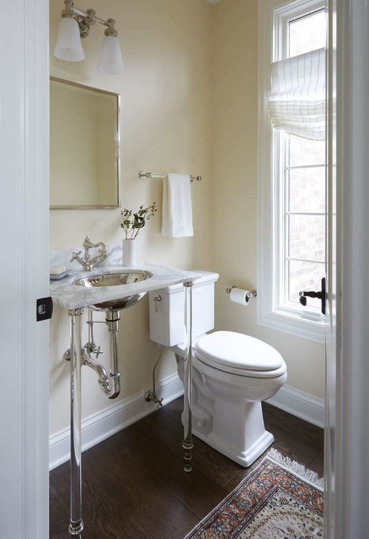 washstand with crystal legs and yellow walls