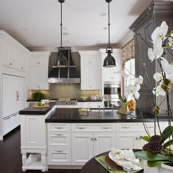 white cabinets and orange wall