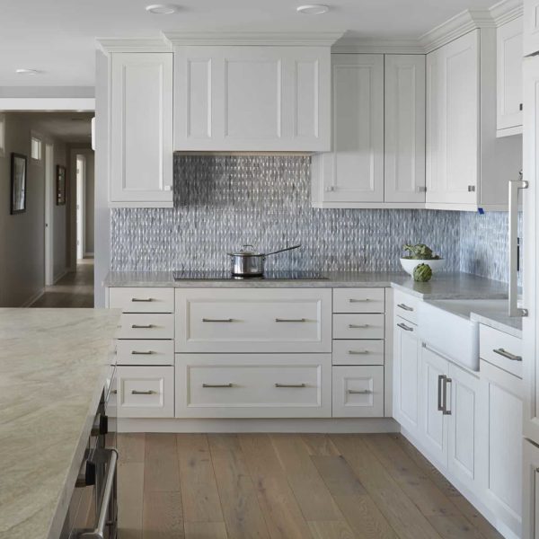classic white kitchen with mosaic tile backsplash
