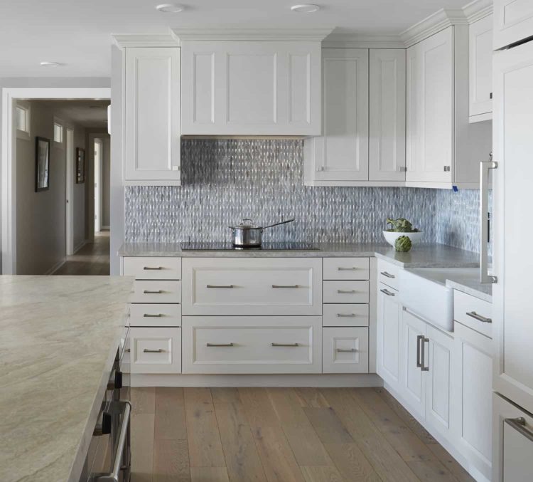 classic white kitchen with mosaic tile backsplash