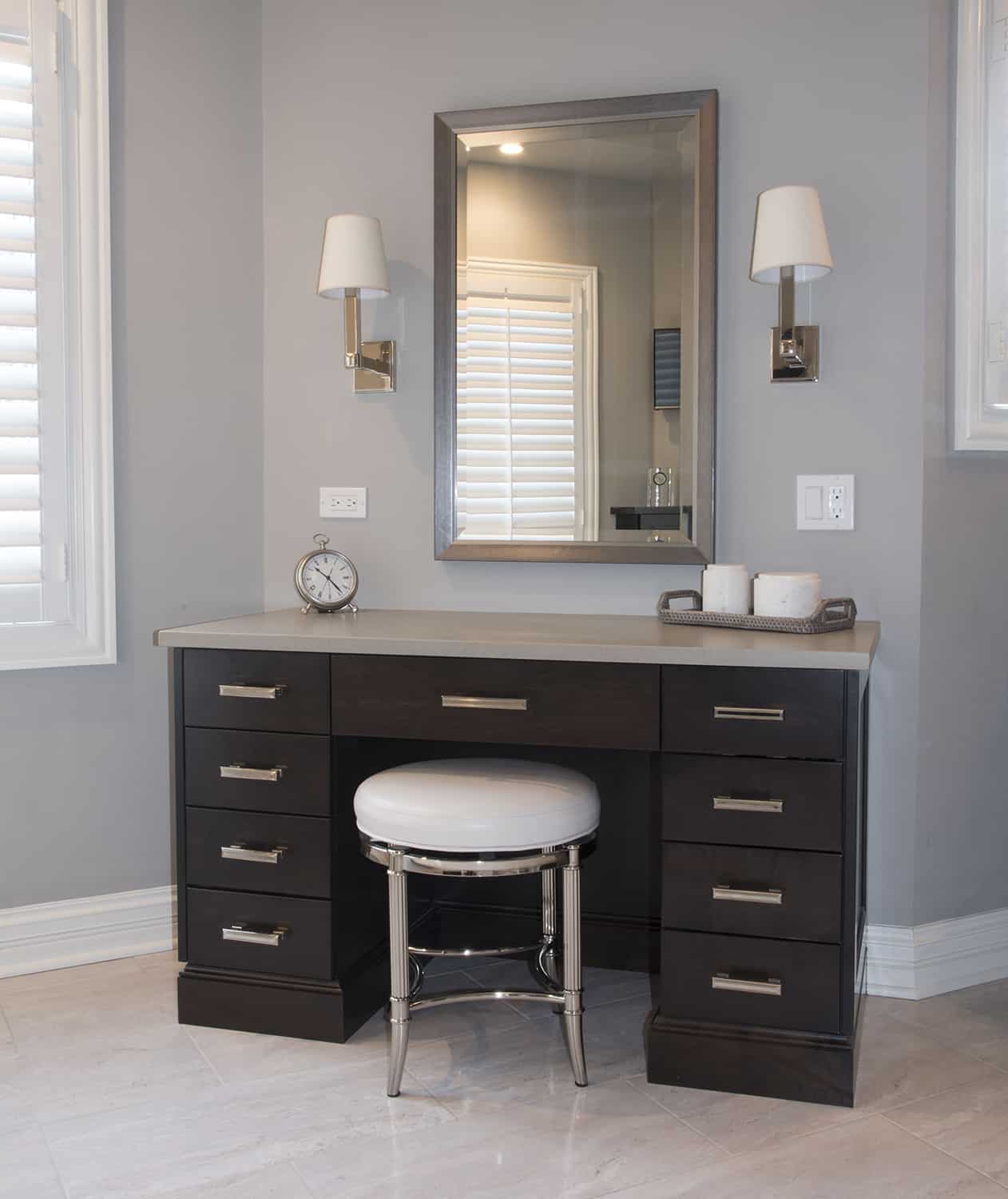 makeup table with mirror and sconces