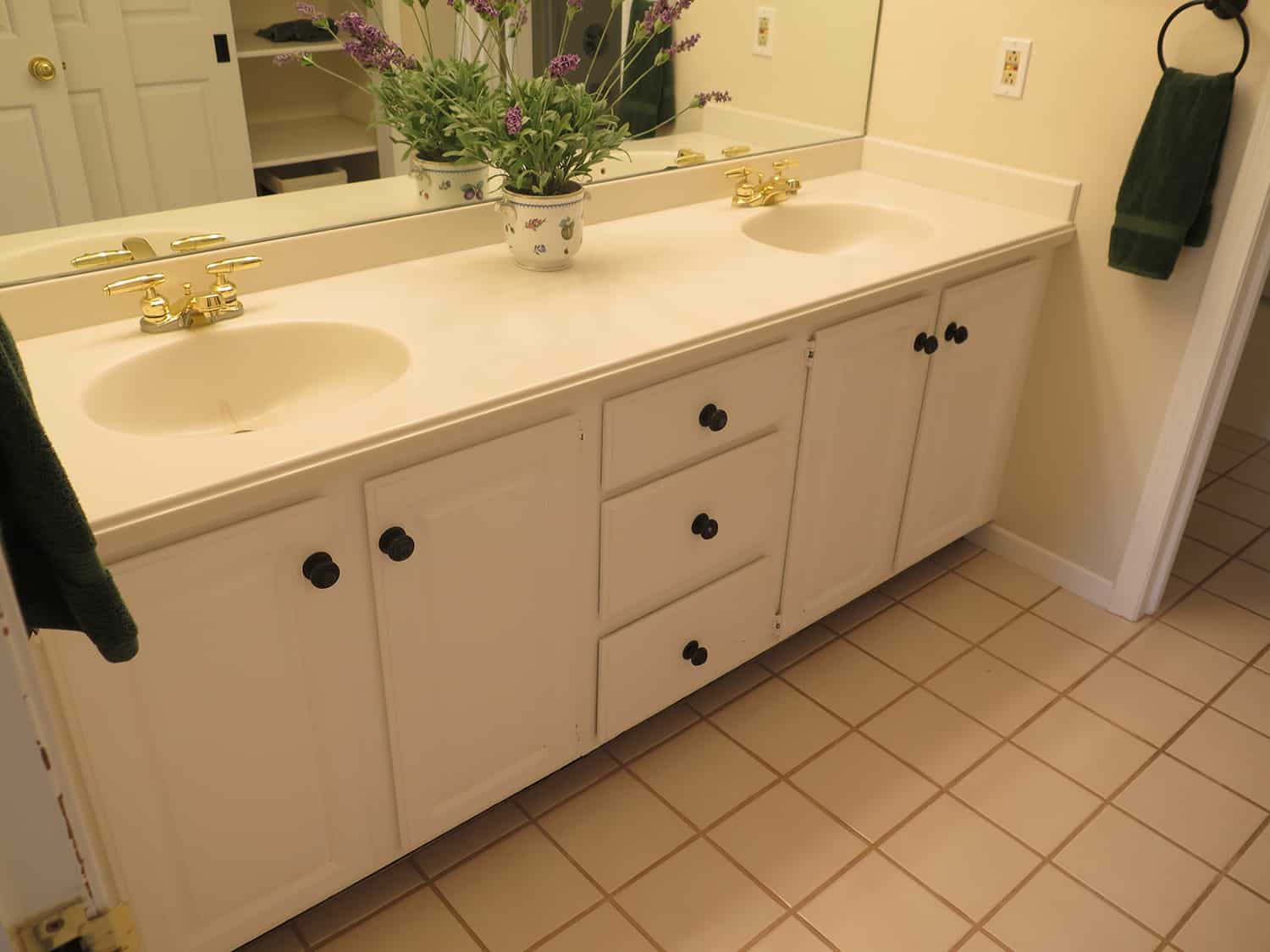 old his and her sinks with laminate countertop