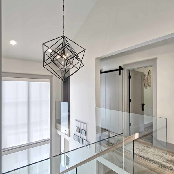 second level landing with glass balustrade second level landing with glass balustrade